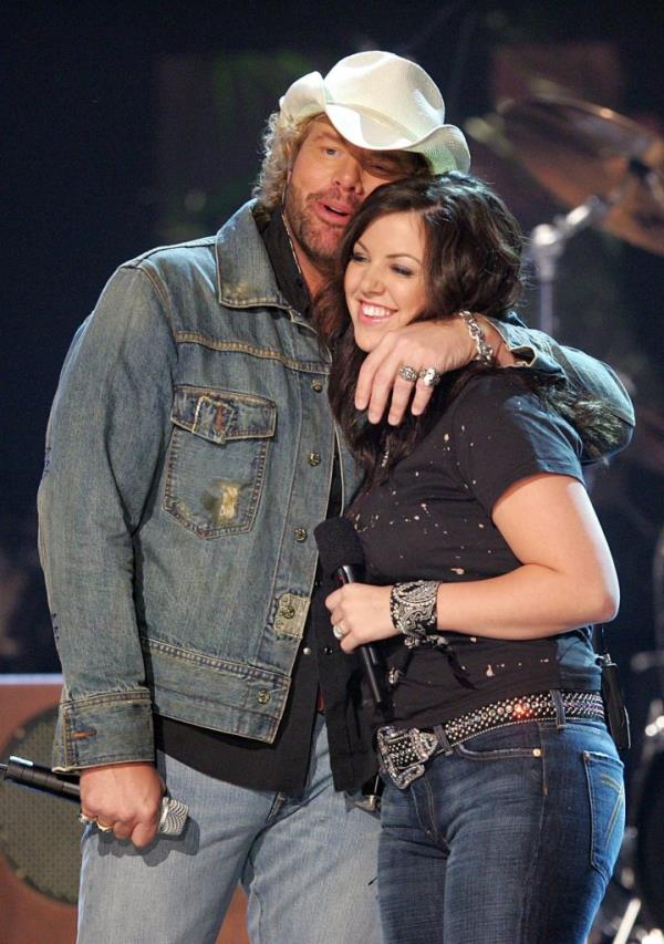 Toby Keith and his daughter Krystal performing on stage at the 38th Annual CMA Awards.