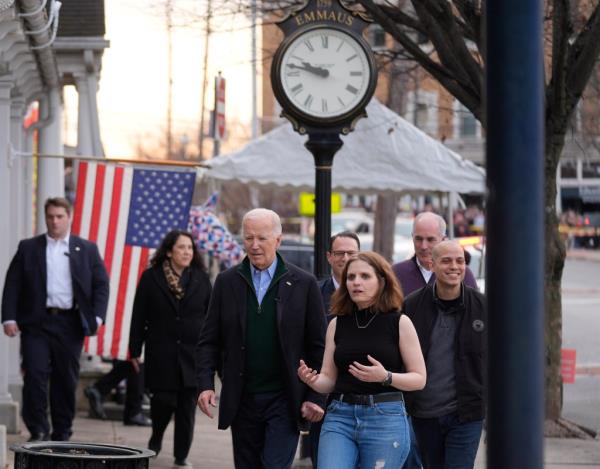 President Joe Biden walks with Lauren Vargas, Co-Owner, President of Nowher<em></em>e Coffee Co., during a visit to discuss his eco<em></em>nomic agenda, Friday, Jan. 12, 2024, in Emmaus, Pa.