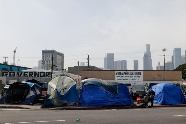 Homeless encampment co<em></em>nsisting of tents lining a street in downtown Los Angeles, California, after approval of Proposition 1 on 22 March 2024