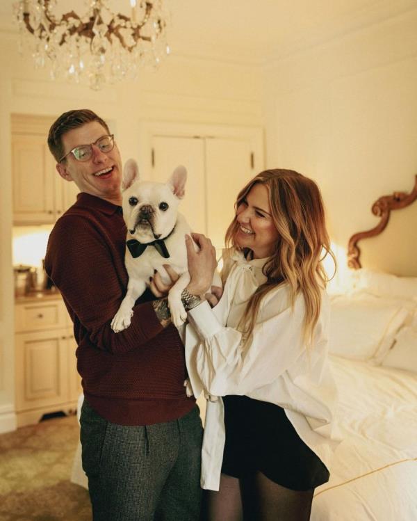 Katelyn and Kyle Sailor with their dog