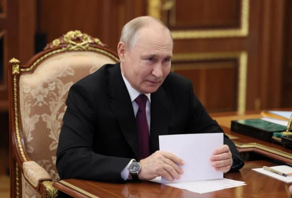 Russian President Vladimir Putin attends a meeting with Chechen leader Ramzan Kadyrov in Moscow on September 28, 2023. 