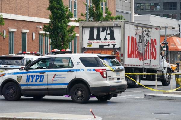 A photo of cops cordo<em></em>ning off the area and of the electric bike