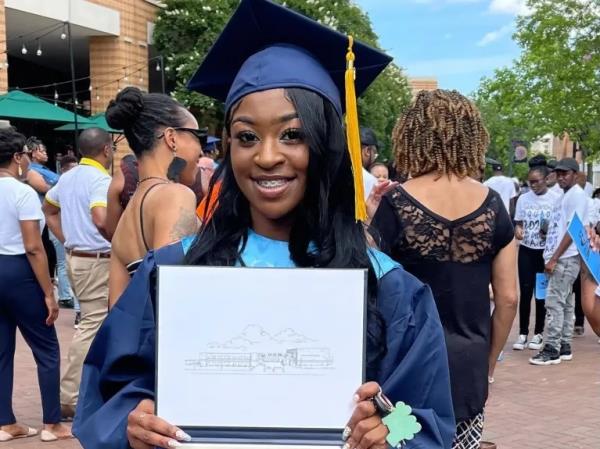Old Dominion University student Lauryn Ni’Kole Leonard, 19, in a cap and gown at her graduation.