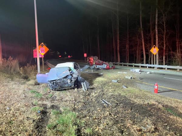 The scene of the February collision showing Cruz-Ferrera's car overturned and Lauryn Ni’Kole Leonard's vehicle totaled on the side of the road.