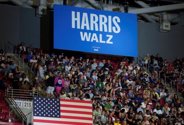 People take their seats ahead of U.S Vice President and Democratic presidential candidate Kamala Harris' rally with her newly chosen vice presidential running mate Minnesota Governor Tim Walz.